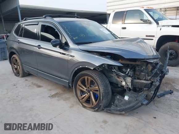 ✅ 2023 Volkswagen Tiguan SE R-Line Black • VIN: 3VVCB7AX2PM107104 • Lot: 42313212. Listed on IAAI with 27,500 mi. Free auction sales archive from the USA and detailed vehicle history report at DreamBid. Image 1.