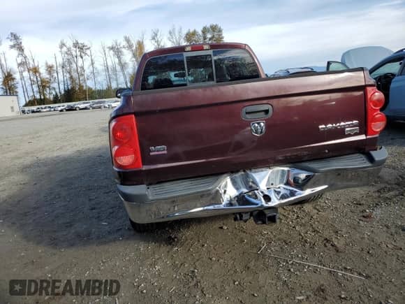 2005 Dodge Dakota Laramie с VIN 1D7HW58NX5S248188, выставлен на аукционе Copart как лот 75443734 с пробегом 209 716 миль миль и Списание • Salvage title. История ставок и продаж доступна на DreamBid. Изображение 6.
