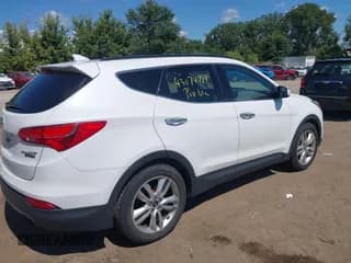 ✅ 2015 Hyundai Santa Fe • VIN: 5XYZWDLA9FG251944 • Лот: 43074781. Опубликован ранее на IAAI с пробегом 136 961 миль. Бесплатный доступ к архиву аукционных продаж из США и подробный отчёт об истории автомобиля на DreamBid. Изображение 4.