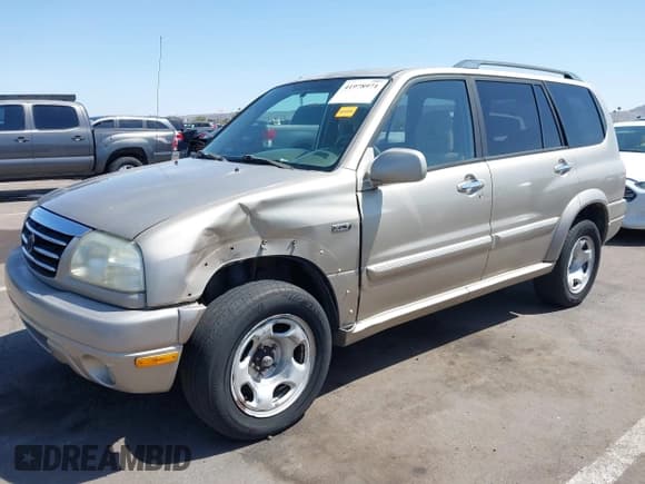 ✅ 2003 Suzuki XL7 Touring • VIN: JS3TX92V534103046 • Lot: 41978971. Listed on IAAI with 185,038 mi. Free auction sales archive from the USA and detailed vehicle history report at DreamBid. Image 6.