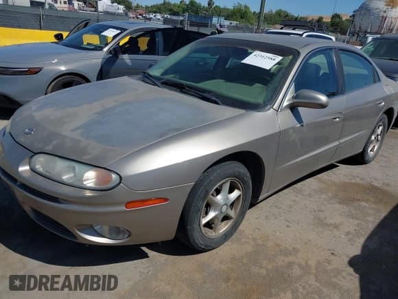 ✅ 2001 Oldsmobile Aurora • VIN: 1G3GR62H414102471 • Lot: 42312588. Listed on IAAI with Not provided. Free auction sales archive from the USA and detailed vehicle history report at DreamBid. Image 2.