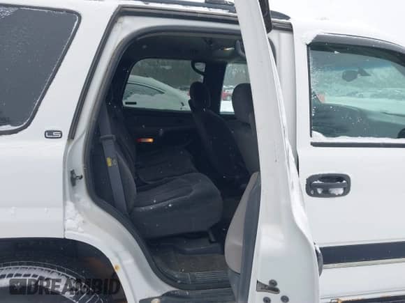 2001 Chevrolet Tahoe LT z VIN 1GNEK13T01J287838, wystawiony jako IAAI lot #41551502 z przebiegiem 145 730 mil mil oraz . Historia ofert i sprzedaży dostępna na DreamBid. Obrazek 8.