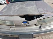 ✅ 1992 Ford Crown Victoria LX • VIN: 2FACP74W9NX243126 • Lot: 42748109. Wystawiony na IAAI z przebiegiem 157 875 mil. Bezpłatny archiwum sprzedaży aukcyjnych z USA i szczegółowy raport historii pojazdu na DreamBid. Zdjęcie 6.