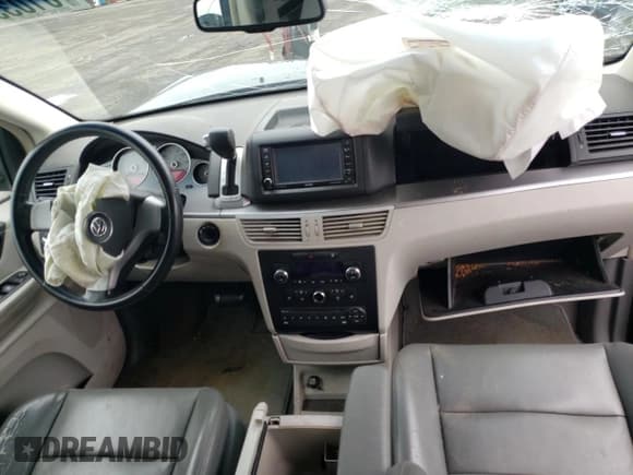 ✅ 2009 Volkswagen Routan SEL • VIN: 2V8HW54X49R580236 • Lot: 61033465. Listed on Copart with 161,293 mi. Free auction sales archive from the USA and detailed vehicle history report at DreamBid. Image 8.