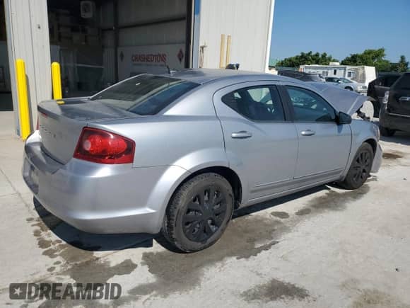 2014 Dodge Avenger SE with VIN 1C3CDZAB3EN168672, listed as a Copart auction lot 68719285 with 128,915 mi miles and Salvage title. Bid and sale history available at DreamBid. Image 3.