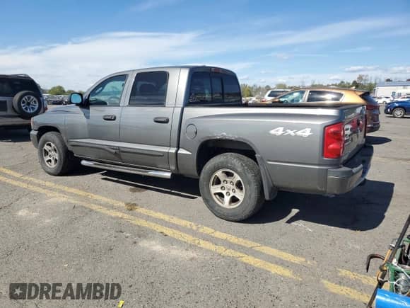 2007 Dodge Dakota SLT с VIN 1D7HW48K97S129387, выставлен на аукционе Copart как лот 74878664 с пробегом 137 525 миль миль и Списание • Salvage title. История ставок и продаж доступна на DreamBid. Изображение 2.