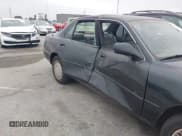 ✅ 1994 Toyota Camry LE • VIN: 4T1GK12E7RU057451 • Лот: 42417533. Опубликован ранее на IAAI с пробегом 421 184 миль. Бесплатный доступ к архиву аукционных продаж из США и подробный отчёт об истории автомобиля на DreamBid. Изображение 6.