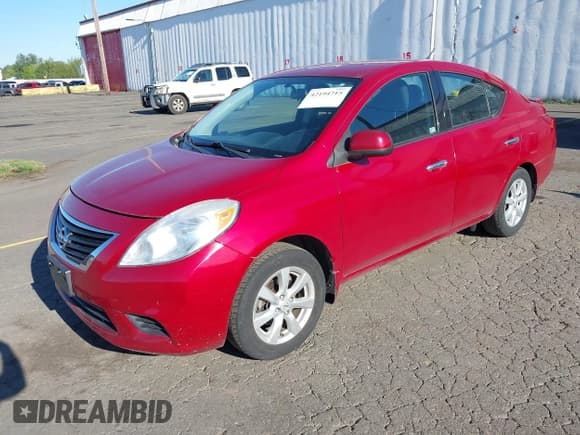✅ 2014 Nissan Versa SV • VIN: 3N1CN7AP5EL820400 • Lot: 42194715. Listed on IAAI with 88,430 mi. Free auction sales archive from the USA and detailed vehicle history report at DreamBid. Image 2.
