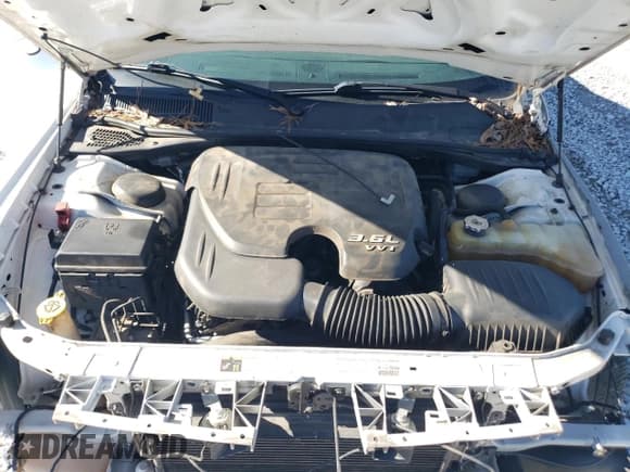 ✅ 2014 Dodge Challenger SXT • VIN: 2C3CDYAG9EH277054 • Lot: 84704754. Wystawiony na Copart z przebiegiem 211 391 mil. Bezpłatny archiwum sprzedaży aukcyjnych z USA i szczegółowy raport historii pojazdu na DreamBid. Zdjęcie 11.