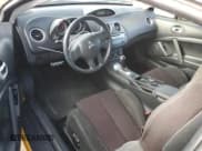 ✅ 2009 Mitsubishi Eclipse GS • VIN: 4A3AK24F89E021202 • Lot: 74162734. Wystawiony na Copart z przebiegiem 95 719 mil. Bezpłatny archiwum sprzedaży aukcyjnych z USA i szczegółowy raport historii pojazdu na DreamBid. Zdjęcie 8.