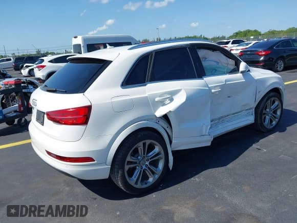 ✅ 2016 Audi Q3 Premium Plus • VIN: WA1BFCFS0GR014028 • Лот: 42274987. Опубликован ранее на IAAI с пробегом 64 667 миль. Бесплатный доступ к архиву аукционных продаж из США и подробный отчёт об истории автомобиля на DreamBid. Изображение 4.