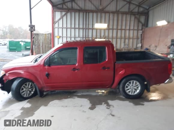 ✅ 2018 Nissan Frontier Pro-4X • VIN: 1N6DD0EV3JN770799 • Lot: 43547945. Listed on IAAI with 99,295 mi. Free auction sales archive from the USA and detailed vehicle history report at DreamBid. Image 14.