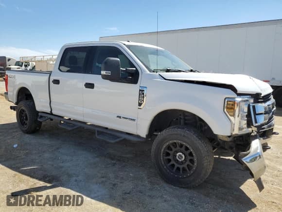 ✅ 2018 Ford F-250 XL • VIN: 1FT7W2BT9JEB38334 • Lot: 66507795. Listed on Copart with 122,685 mi. Free auction sales archive from the USA and detailed vehicle history report at DreamBid. Image 4.