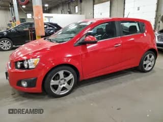 ✅ 2015 Chevrolet Sonic LTZ • VIN: 1G1JE6SB6F4199279 • Lot: 86112665. Listed on Copart with 158,443 mi. Free auction sales archive from the USA and detailed vehicle history report at DreamBid. Image 1.