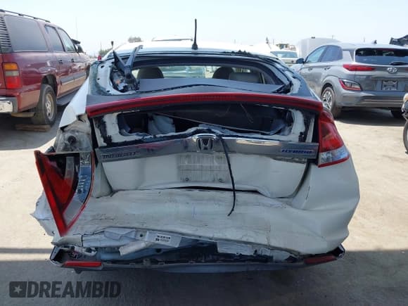 ✅ 2014 Honda Insight LX • VIN: JHMZE2H51ES001317 • Лот: 42587972. Опубликован ранее на IAAI с пробегом 191 780 миль. Бесплатный доступ к архиву аукционных продаж из США и подробный отчёт об истории автомобиля на DreamBid. Изображение 17.