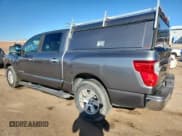 ✅ 2017 Nissan Titan SV • VIN: 1N6AA1E56HN500512 • Lot: 81644115. Wystawiony na Copart z przebiegiem 219 825 mil. Bezpłatny archiwum sprzedaży aukcyjnych z USA i szczegółowy raport historii pojazdu na DreamBid. Zdjęcie 2.