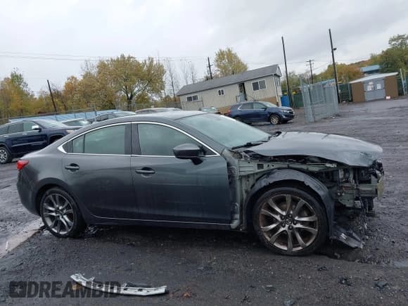 ✅ 2017 Mazda 6 Grand Touring • VIN: JM1GL1X56H1137852 • Лот: 43495173. Опубликован ранее на IAAI с пробегом 62 625 миль. Бесплатный доступ к архиву аукционных продаж из США и подробный отчёт об истории автомобиля на DreamBid. Изображение 13.