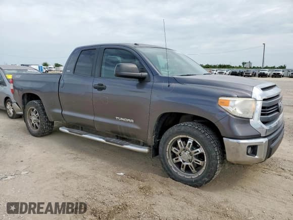 ✅ 2015 Toyota Tundra SR • VIN: 5TFRM5F15FX094689 • Lot: 65120135. Listed on Copart with 115,542 mi. Free auction sales archive from the USA and detailed vehicle history report at DreamBid. Image 4.