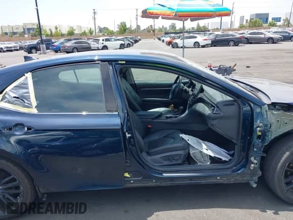 2021 Toyota Camry Hybrid XSE z VIN 4T1K31AKXMU567932, wystawiony jako IAAI lot #42587525 z przebiegiem 109 220 mil mil oraz . Historia ofert i sprzedaży dostępna na DreamBid. Obrazek 14.