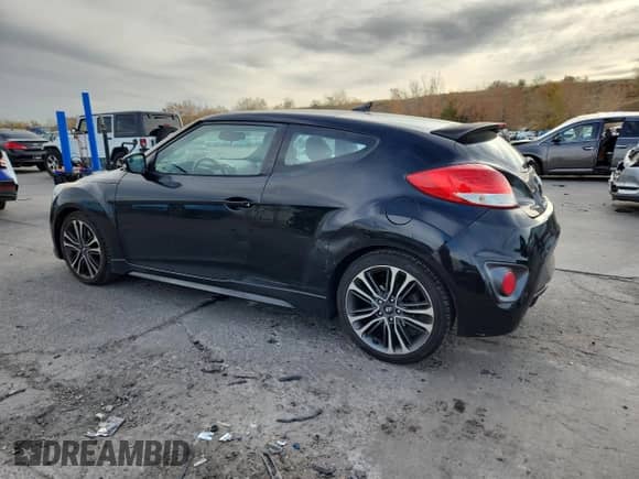 2016 Hyundai Veloster Turbo z VIN KMHTC6AE7GU255633, wystawiony jako Copart lot #91070115 z przebiegiem 95 384 mil mil oraz Czysty tytuł • Clean title. Historia ofert i sprzedaży dostępna na DreamBid. Obrazek 2.