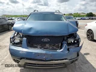 ✅ 2005 Ford Freestyle SEL • VIN: 1FMDK021X5GA25385 • Lot: 72239954. Wystawiony na Copart z przebiegiem 161 219 mil. Bezpłatny archiwum sprzedaży aukcyjnych z USA i szczegółowy raport historii pojazdu na DreamBid. Zdjęcie 5.