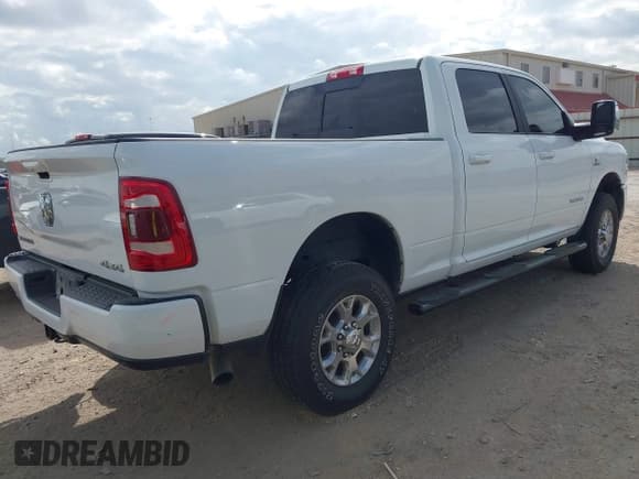 ✅ 2023 Ram 2500 Laramie • VIN: 3C6UR5FL4PG588486 • Lot: 43459732. Listed on IAAI with 54,339 mi. Free auction sales archive from the USA and detailed vehicle history report at DreamBid. Image 4.