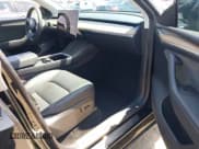 ✅ 2023 Tesla Model Y Long Range • VIN: 7SAYGDEE0PA023719 • Lot: 41974415. Listed on IAAI with 50,152 mi. Free auction sales archive from the USA and detailed vehicle history report at DreamBid. Image 5.