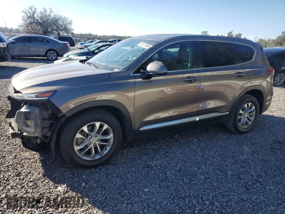 ✅ 2019 Hyundai Santa Fe SE • VIN: 5NMS23AD9KH101451 • Lot: 91171595. Listed on Copart with 127,277 mi. Free auction sales archive from the USA and detailed vehicle history report at DreamBid. Image 1.