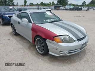 2004 Hyundai Tiburon GT с VIN KMHHN65F74U127696, выставлен на аукционе IAAI как лот 42126095 с пробегом 159 902 миль миль и . История ставок и продаж доступна на DreamBid. Изображение 1.