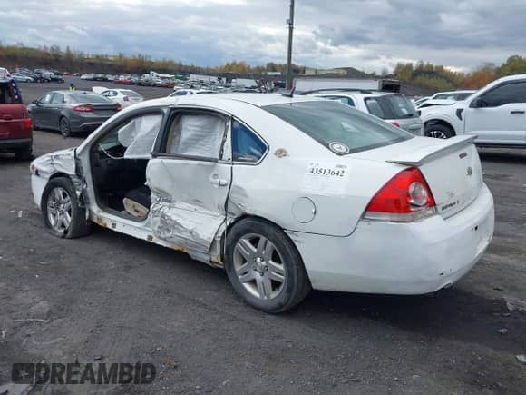 2012 Chevrolet Impala LT Fleet with VIN 2G1WG5E3XC1300734, listed as a IAAI auction lot 43513642 with 165,431 mi miles and . Bid and sale history available at DreamBid. Image 3.