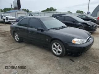 ✅ 1998 Ford Contour • VIN: 1FALP68GXWK137771 • Lot: 55207535. Wystawiony na Copart z przebiegiem 41 365 mil. Bezpłatny archiwum sprzedaży aukcyjnych z USA i szczegółowy raport historii pojazdu na DreamBid. Zdjęcie 4.