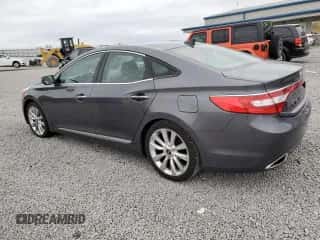 2013 Hyundai Azera z VIN KMHFH4JG2DA320373, wystawiony jako Copart lot #49679045 z przebiegiem 104 742 mil mil oraz Szkoda całkowita • Salvage title. Historia ofert i sprzedaży dostępna na DreamBid. Obrazek 2.
