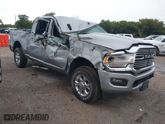 ✅ 2024 Ram 2500 Laramie • VIN: 3C6UR5FL6RG417256 • Lot: 43276380. Listed on IAAI with 13 mi. Free auction sales archive from the USA and detailed vehicle history report at DreamBid. Image 1.