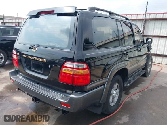 ✅ 2000 Toyota Land Cruiser • VIN: JT3HT05J1Y0081635 • Lot: 41938432. Listed on IAAI with 362,389 mi. Free auction sales archive from the USA and detailed vehicle history report at DreamBid. Image 4.