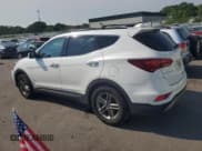 ✅ 2017 Hyundai Santa Fe 2.4L • VIN: 5XYZUDLBXHG423657 • Лот: 59458744. Опубликован ранее на Copart с пробегом 105 726 миль. Бесплатный доступ к архиву аукционных продаж из США и подробный отчёт об истории автомобиля на DreamBid. Изображение 2.