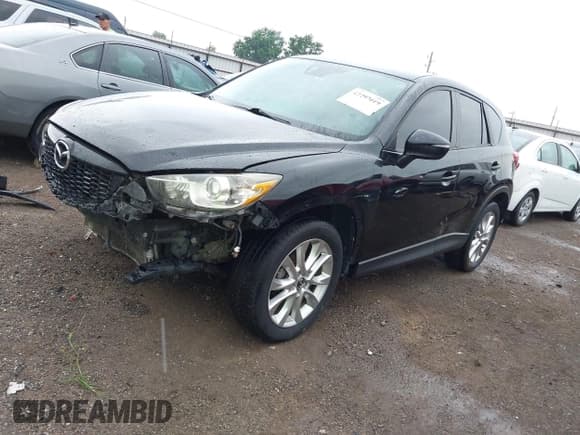 ✅ 2015 Mazda CX-5 Grand Touring • VIN: JM3KE2DY3F0479133 • Lot: 42297019. Wystawiony na IAAI z przebiegiem 152 669 mil. Bezpłatny archiwum sprzedaży aukcyjnych z USA i szczegółowy raport historii pojazdu na DreamBid. Zdjęcie 18.