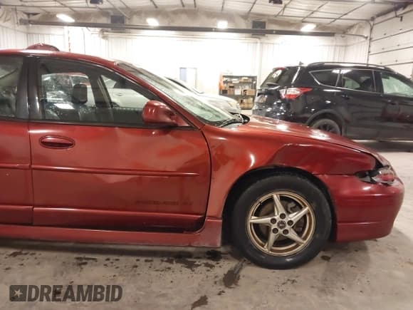 ✅ 2003 Pontiac Grand Prix GT • VIN: 1G2WP52K93F116367 • Лот: 43664013. Опубликован ранее на IAAI с пробегом 199 688 миль. Бесплатный доступ к архиву аукционных продаж из США и подробный отчёт об истории автомобиля на DreamBid. Изображение 6.