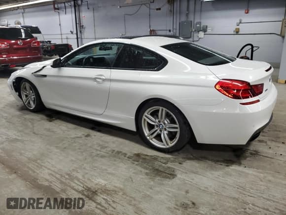 ✅ 2013 BMW 6 Series 650i xDrive • VIN: WBAYM1C58DDZ02671 • Лот: 59509955. Опубликован ранее на Copart с пробегом 76 630 миль. Бесплатный доступ к архиву аукционных продаж из США и подробный отчёт об истории автомобиля на DreamBid. Изображение 2.