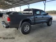 ✅ 2002 Dodge Dakota Sport • VIN: 1B7HG38N12S515919 • Lot: 42930835. Wystawiony na Copart z przebiegiem 180 701 mil. Bezpłatny archiwum sprzedaży aukcyjnych z USA i szczegółowy raport historii pojazdu na DreamBid. Zdjęcie 3.