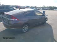 ✅ 2013 Honda Insight LX • VIN: JHMZE2H58DS001247 • Lot: 43801615. Listed on IAAI with 113,454 mi. Free auction sales archive from the USA and detailed vehicle history report at DreamBid. Image 4.