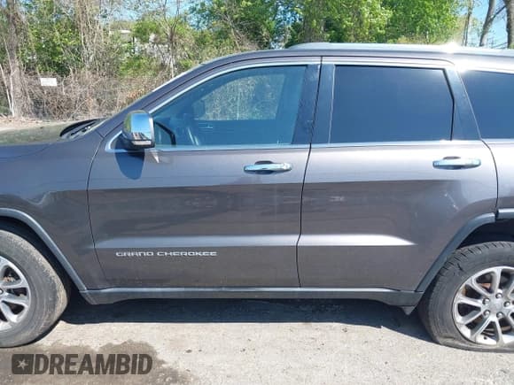 ✅ 2014 Jeep Grand Cherokee Limited • VIN: 1C4RJFBG0EC569499 • Lot: 42187067. Listed on IAAI with 146,159 mi. Free auction sales archive from the USA and detailed vehicle history report at DreamBid. Image 14.