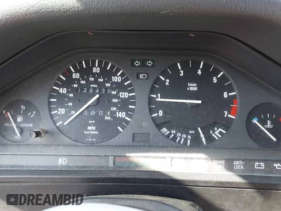 1992 BMW 3 Series z VIN WBABB2314NEC28869, wystawiony jako IAAI lot #42132873 z przebiegiem 129 436 mil mil oraz . Historia ofert i sprzedaży dostępna na DreamBid. Obrazek 7.