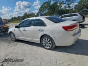 ✅ 2011 Lincoln MKZ Hybrid • VIN: 3LNDL2L30BR753570 • Лот: 93629605. Опубликован ранее на Copart с пробегом 136 592 миль. Бесплатный доступ к архиву аукционных продаж из США и подробный отчёт об истории автомобиля на DreamBid. Изображение 2.