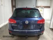 ✅ 2012 Volkswagen Touareg Lux • VIN: WVGEF9BP1CD010287 • Лот: 71975045. Опубликован ранее на Copart с пробегом 130 238 миль. Бесплатный доступ к архиву аукционных продаж из США и подробный отчёт об истории автомобиля на DreamBid. Изображение 6.