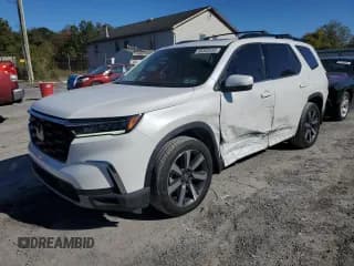 ✅ 2023 Honda Pilot Touring • VIN: 5FNYG1H70PB014840 • Lot: 85300455. Listed on Copart with 32,981 mi. Free auction sales archive from the USA and detailed vehicle history report at DreamBid. Image 1.