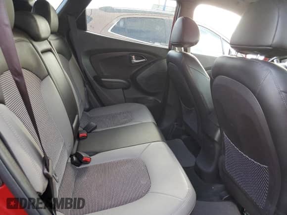 2012 Hyundai Tucson GLS z VIN KM8JU3AC9CU487792, wystawiony jako Copart lot #74331604 z przebiegiem Nie podano mil oraz Szkoda całkowita • Salvage title. Historia ofert i sprzedaży dostępna na DreamBid. Obrazek 11.