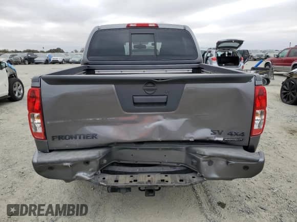 2021 Nissan Frontier Pro-4X with VIN 1N6ED0EB8MN706577, listed as a Copart auction lot 84050325 with 75,821 mi miles and Salvage title. Bid and sale history available at DreamBid. Image 6.