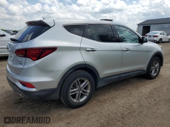 ✅ 2017 Hyundai Santa Fe 2.4L • VIN: 5XYZTDLB9HG466552 • Lot: 57265315. Listed on Copart with 123,390 mi. Free auction sales archive from the USA and detailed vehicle history report at DreamBid. Image 3.