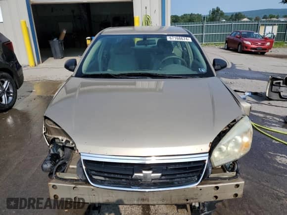 2007 Chevrolet Malibu 1LS z VIN 1G1ZS58F57F186058, wystawiony jako Copart lot #67168674 z przebiegiem 250 035 mil mil oraz Szkoda całkowita • Salvage title. Historia ofert i sprzedaży dostępna na DreamBid. Obrazek 5.