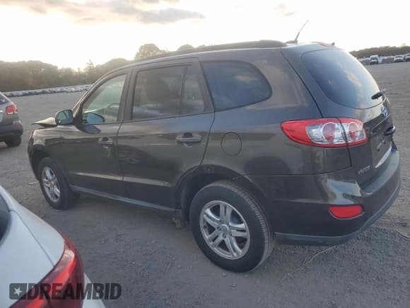 ✅ 2011 Hyundai Santa Fe GLS • VIN: 5XYZGDAB9BG070264 • Lot: 75601524. Listed on Copart with 145,035 mi. Free auction sales archive from the USA and detailed vehicle history report at DreamBid. Image 2.